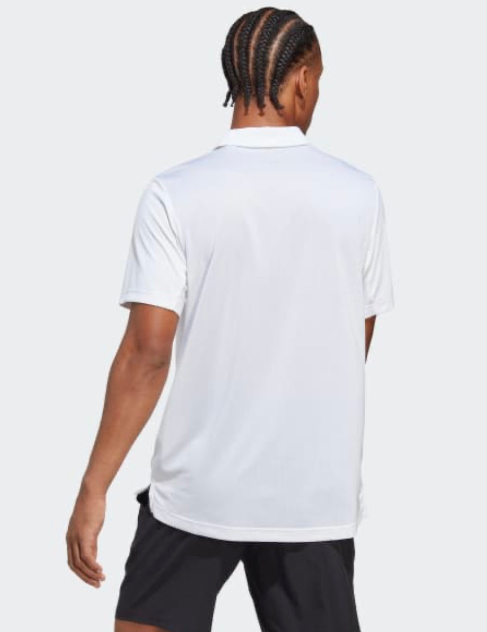 Détail du tissu respirant du polo Adidas Club White