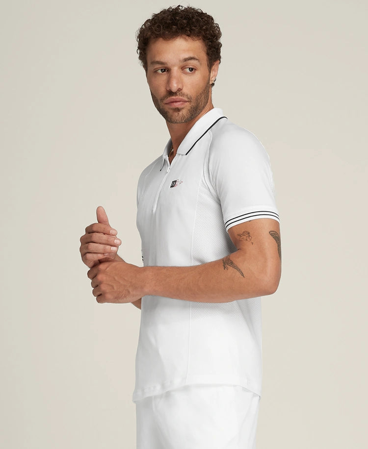 Joueur portant Polo Wilson Bela Seamless Blanc en action