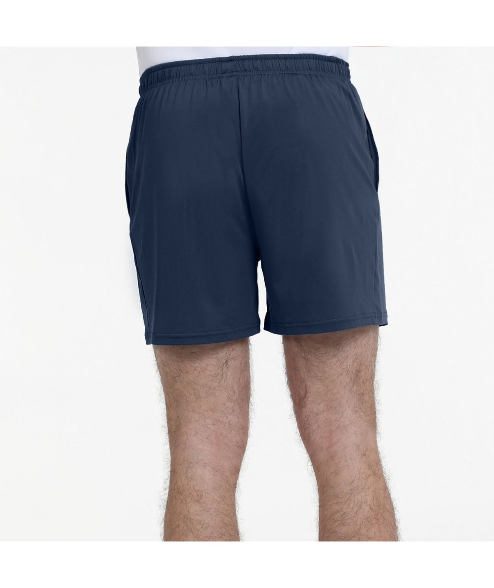 Model wearing Short Bullpadel Meis Azul Marino shorts