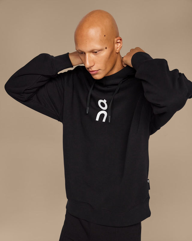 Sweat à capuche On noir au design épuré et coupe décontractée

