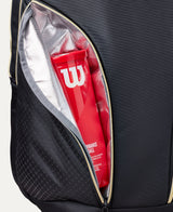 Sac à dos de padel Wilson Defy V1 noir avec compartiments pour raquettes et accessoires, visible en image.