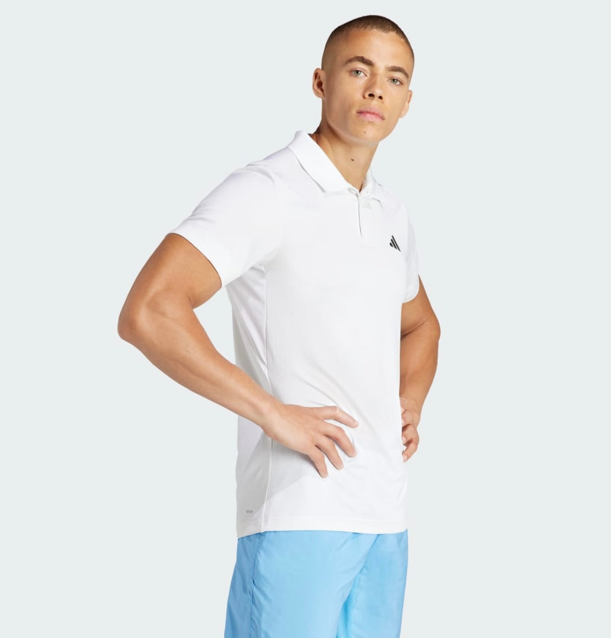Détail tissu Polo Adidas Freelift Blanc