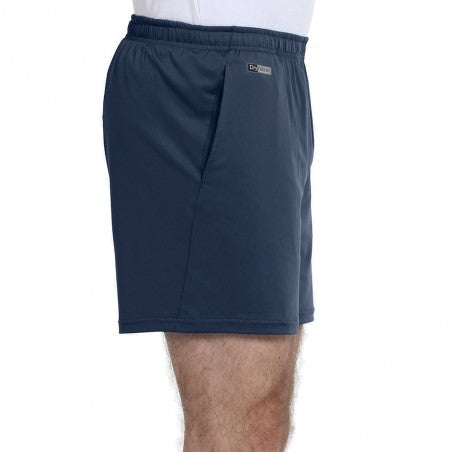 Short Bullpadel Meis Bleu porté en match de padel