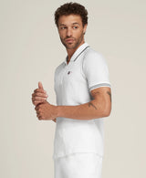 Joueur portant Polo Wilson Bela Seamless Blanc en action