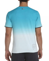Tee Shirt Bullpadel Merga Turquoise porté en match de padel