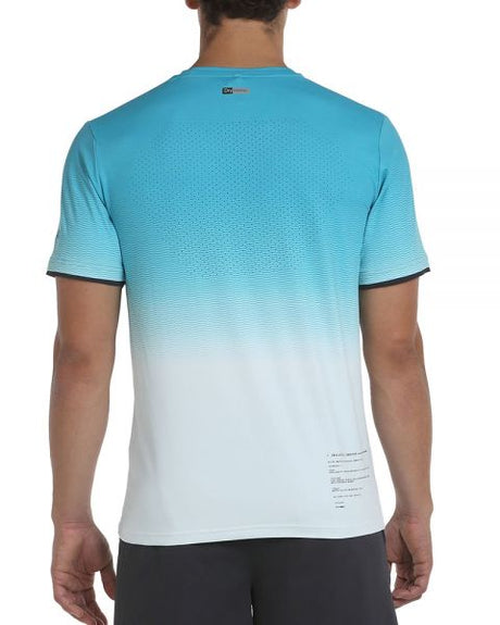 Tee Shirt Bullpadel Merga Turquoise porté en match de padel